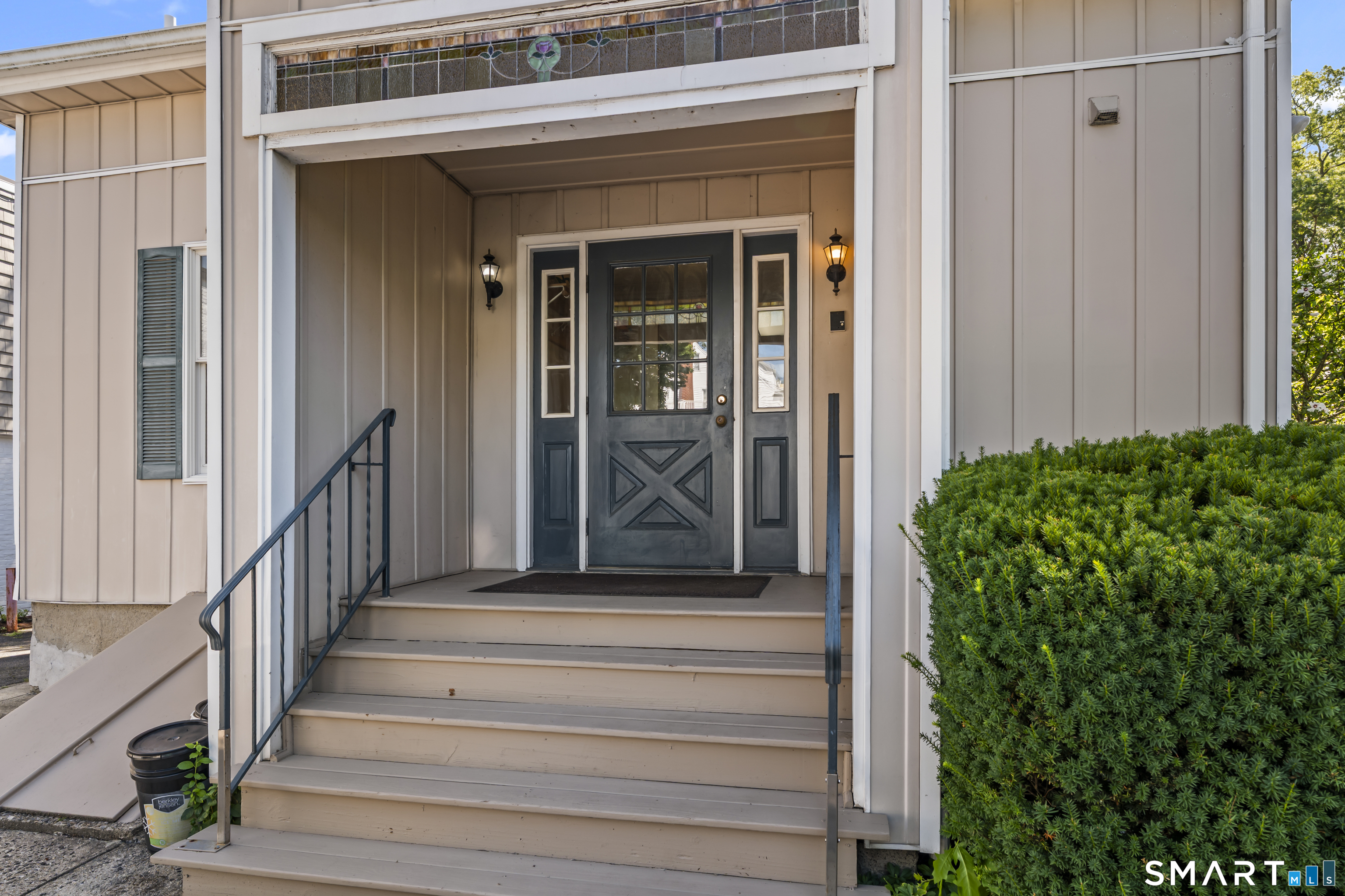 506 Old Stratfield Road Fairfield, CT 06825 - Photo 4 of 23 Rear entrance with pretty stained glass, rear and front access. This is right off parking area, handicap ramp to side with designated spot.