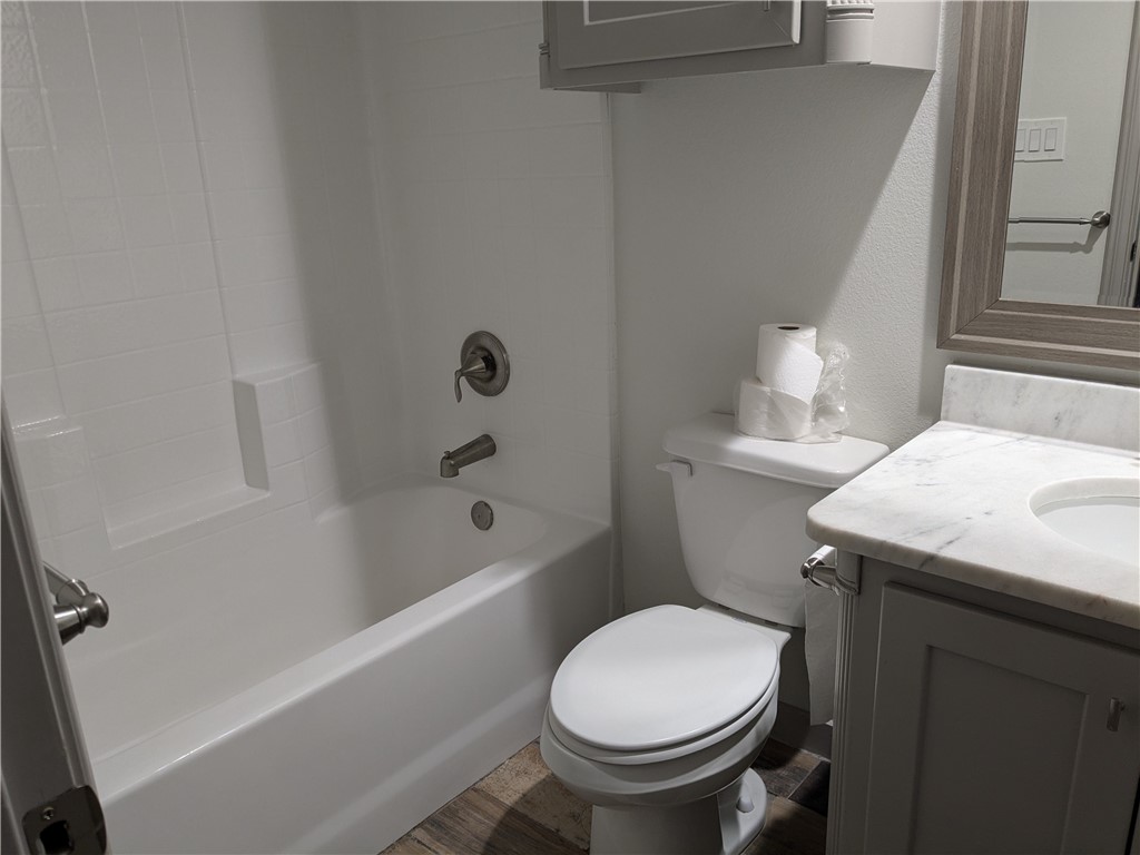 5375 County Road 73A, Unit D75 Robstown, TX 78380 - Photo 11 of 14 a bathroom with a sink and a toilet