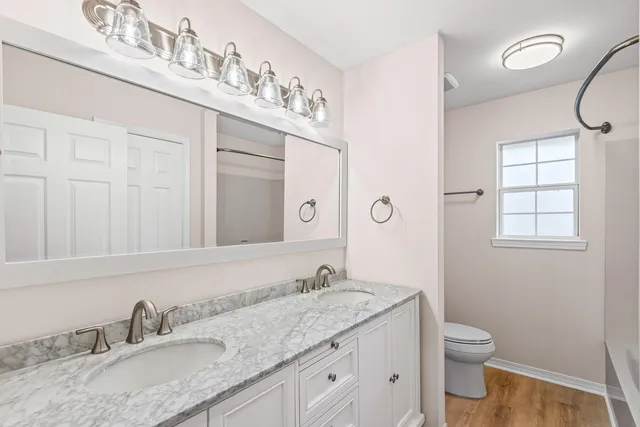 a bathroom with a bath tub and a shower