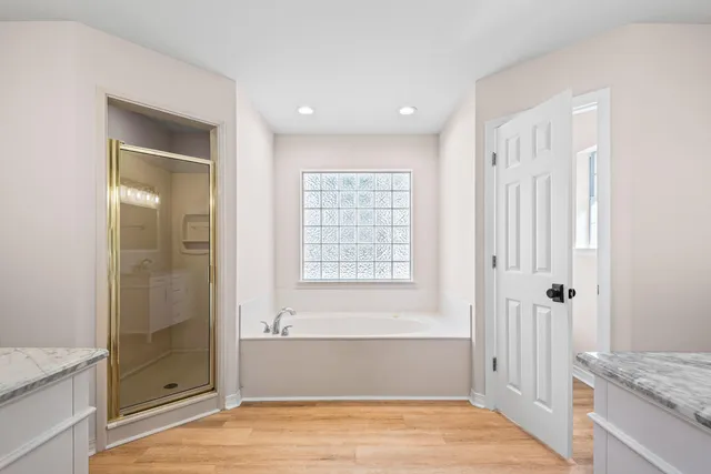 a bathroom with a granite countertop sink mirror and