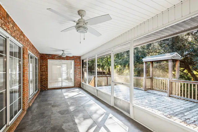 a porch with seating space and yard