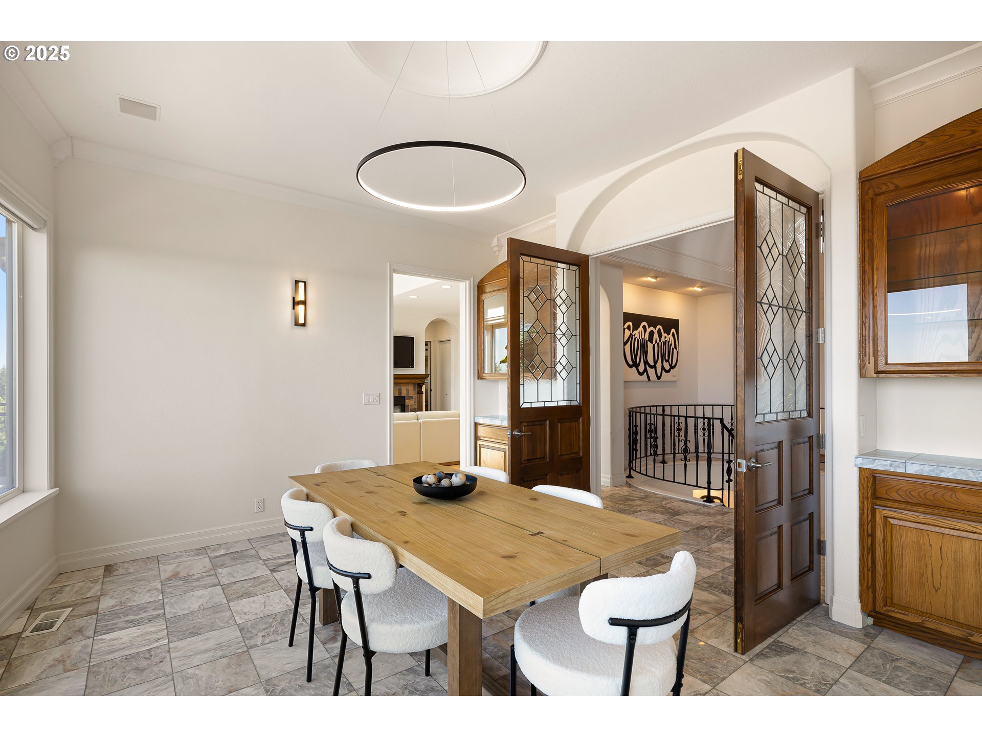 2647 West 29th Avenue Eugene, OR 97405 - Photo 15 of 48 a view of a dining room with furniture and wooden floor
