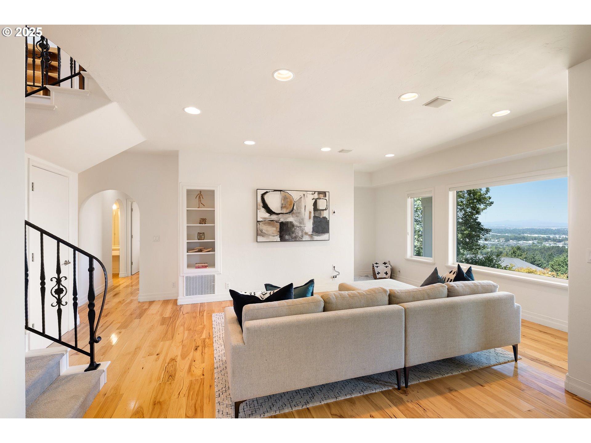 2647 West 29th Avenue Eugene, OR 97405 - Photo 24 of 48 a living room with furniture wooden floor and a large window