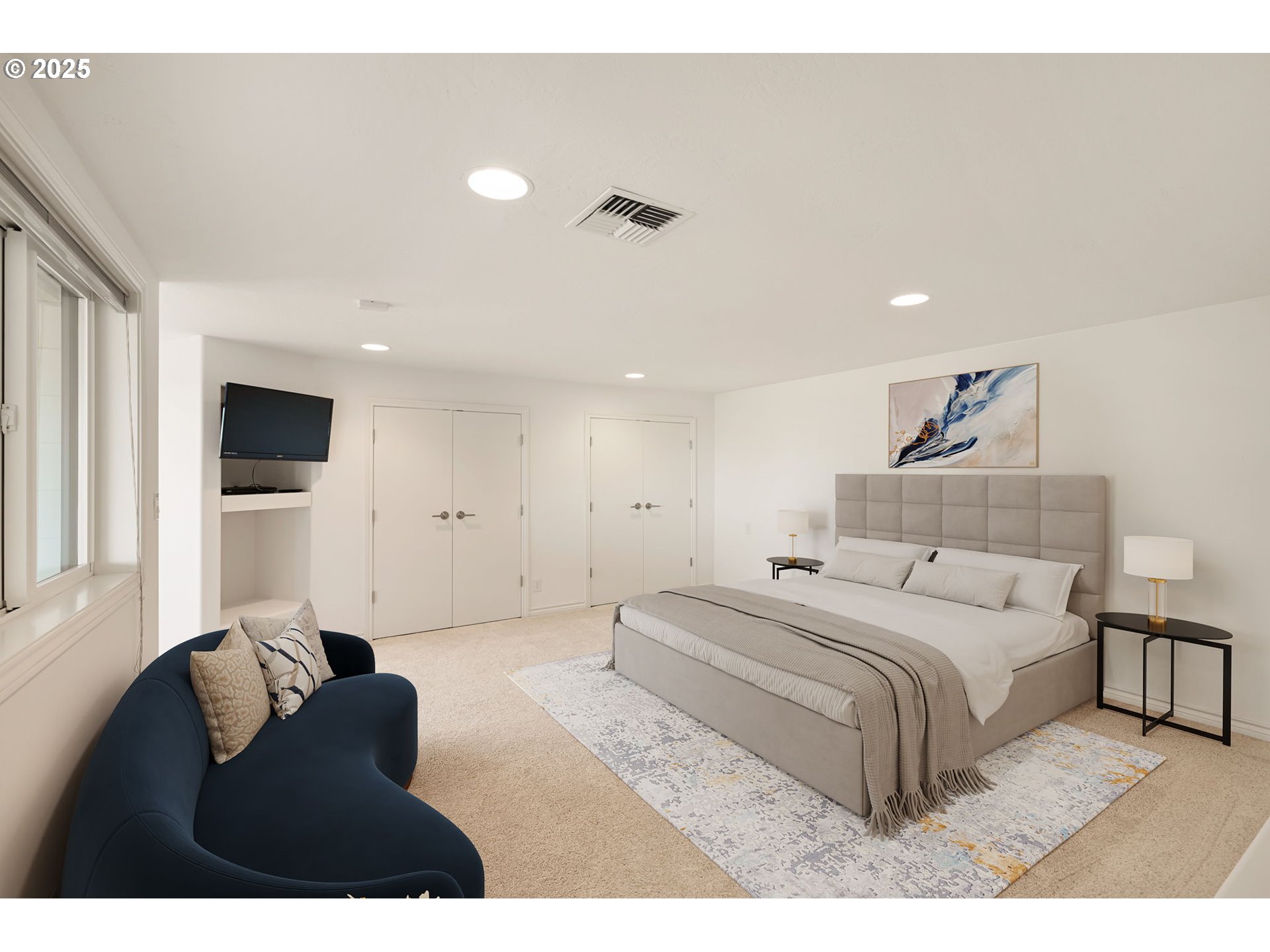 2647 West 29th Avenue Eugene, OR 97405 - Photo 39 of 48 a bedroom with a bed and a television