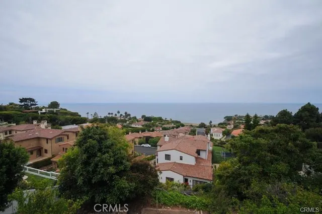 an aerial view of a city with lots of residential buildings