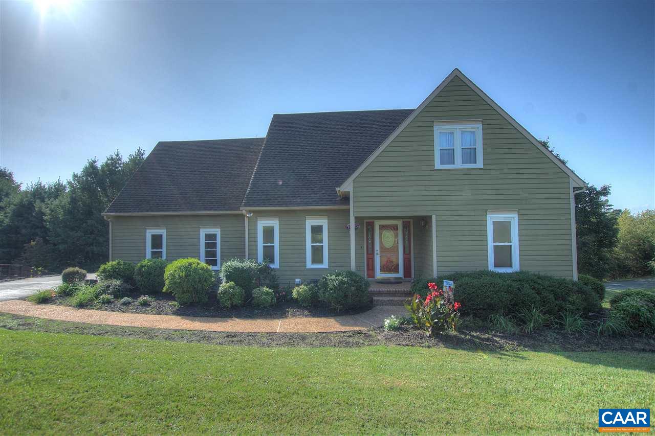 4865 Mechums River Road Charlottesville, VA 22901 - Photo 1 of 45 a front view of house with yard and green space