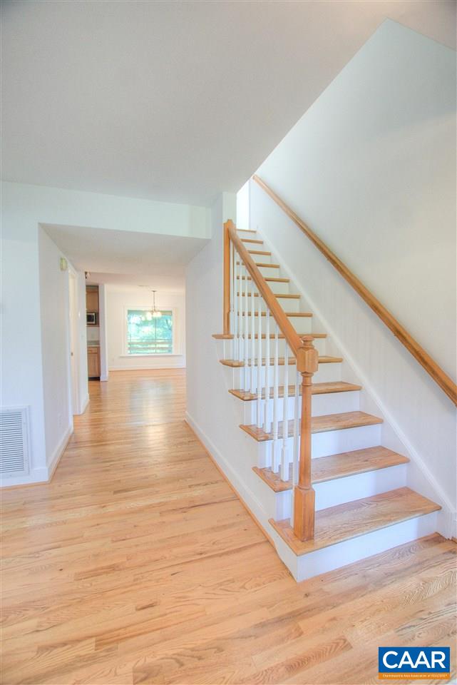 4865 Mechums River Road Charlottesville, VA 22901 - Photo 16 of 45 a view of entryway and hall with wooden floor
