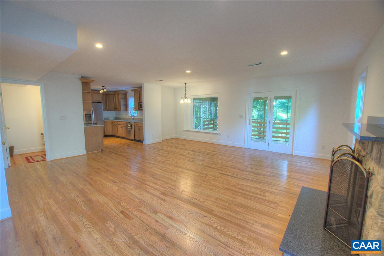 4865 Mechums River Road Charlottesville, VA 22901 - Photo 17 of 45 a view of empty room with wooden floor