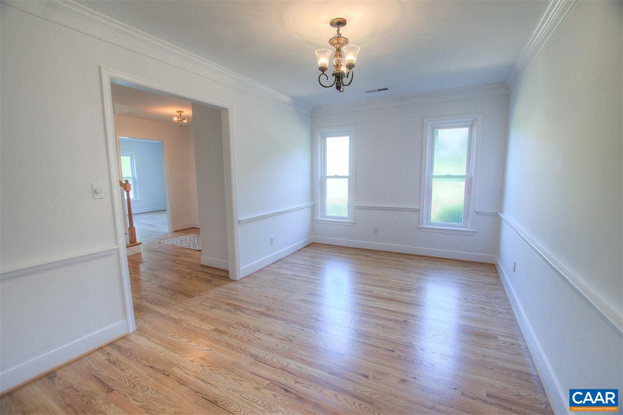 4865 Mechums River Road Charlottesville, VA 22901 - Photo 20 of 45 wooden floor in an empty room with a window