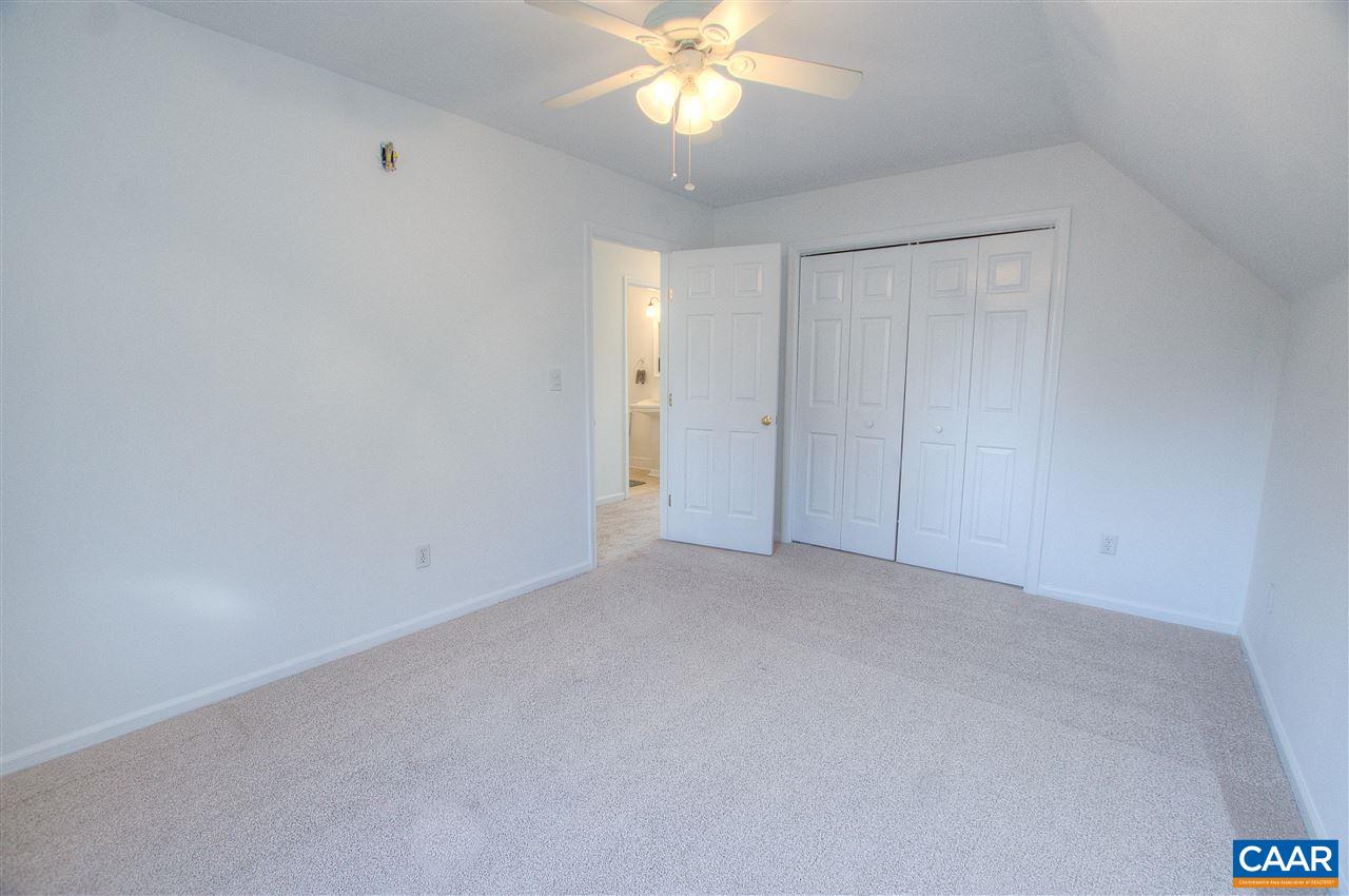 4865 Mechums River Road Charlottesville, VA 22901 - Photo 30 of 45 a view of an empty room with a window