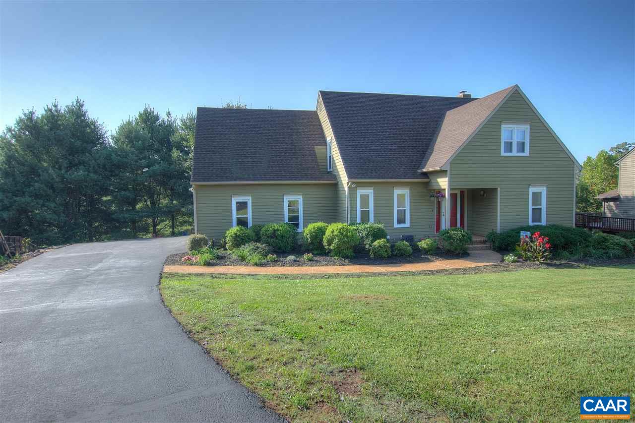 4865 Mechums River Road Charlottesville, VA 22901 - Photo 3 of 45 a front view of a house with garden