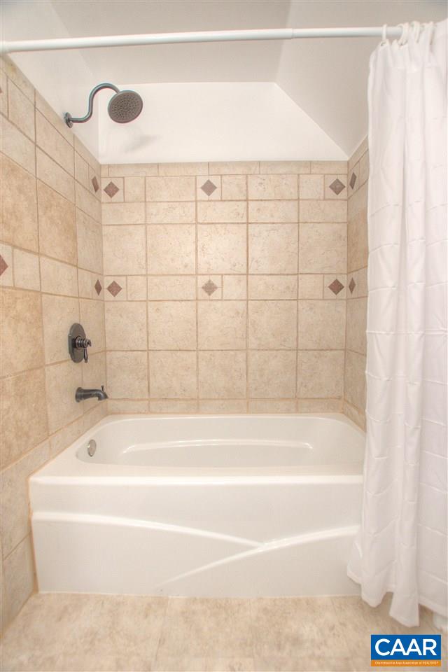 4865 Mechums River Road Charlottesville, VA 22901 - Photo 37 of 45 a bathroom with a bathtub and shower