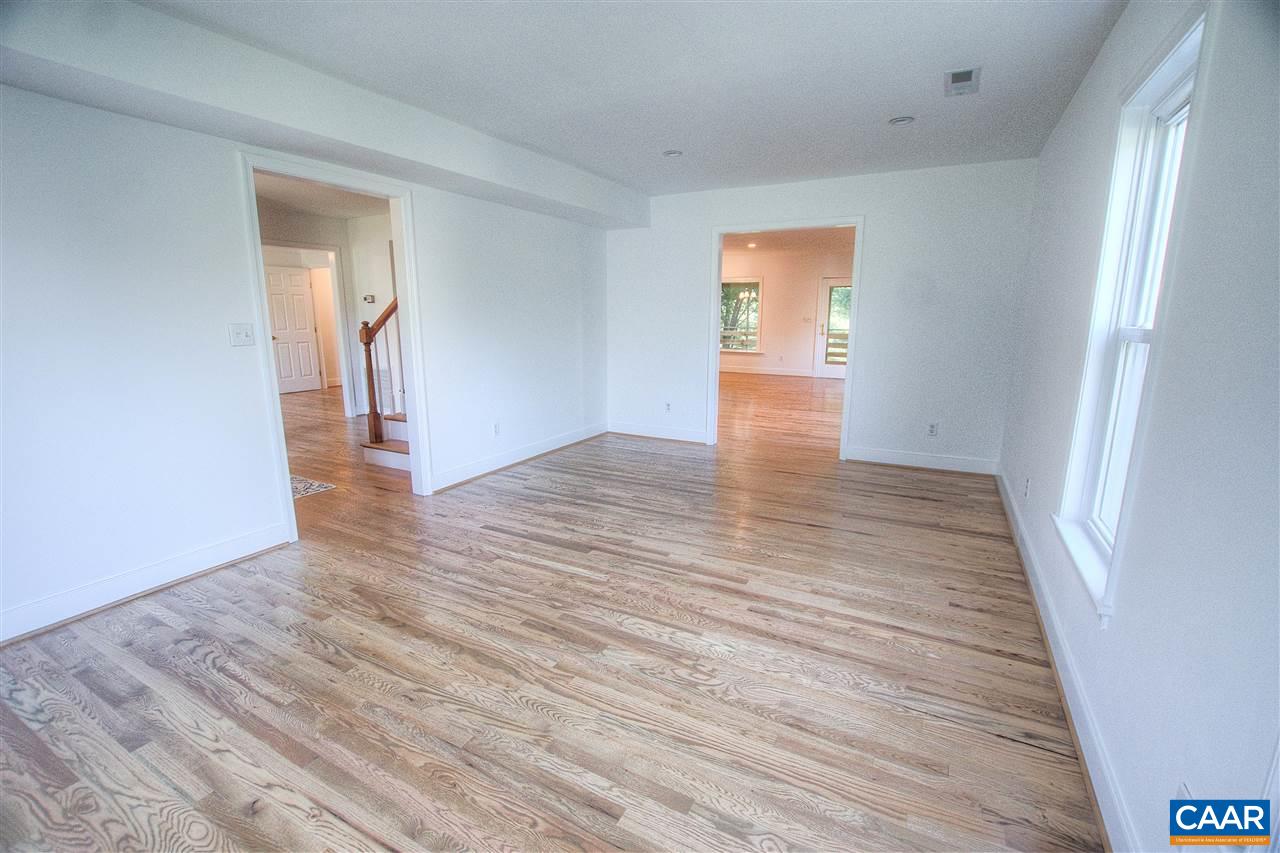 4865 Mechums River Road Charlottesville, VA 22901 - Photo 39 of 45 a view of an empty room and wooden floor