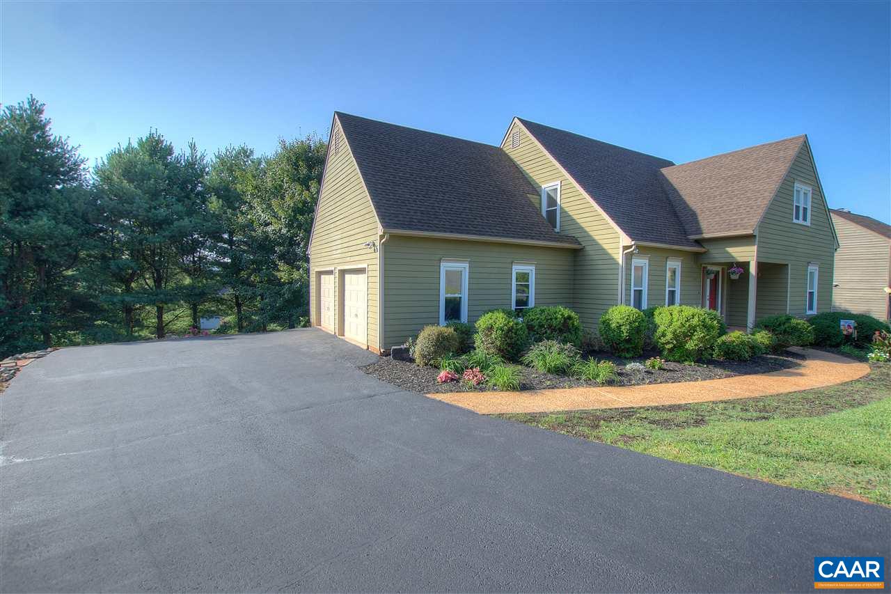 4865 Mechums River Road Charlottesville, VA 22901 - Photo 5 of 45 a front view of a house with a yard