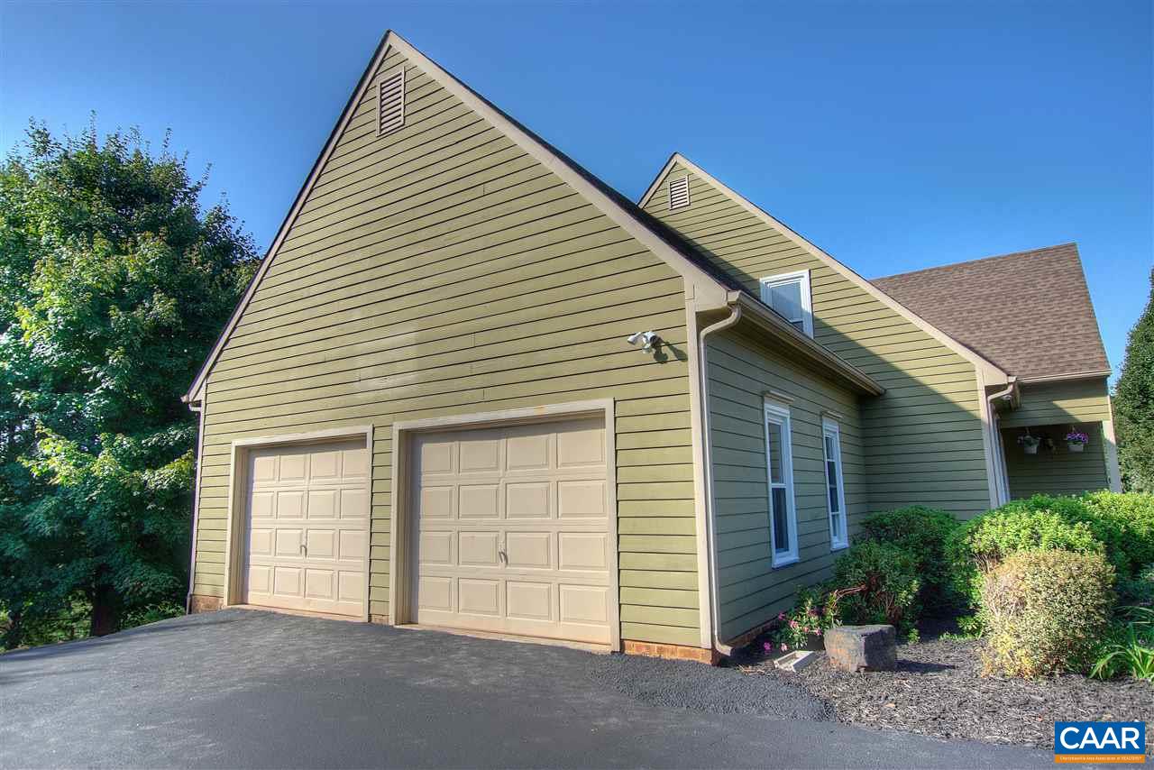 4865 Mechums River Road Charlottesville, VA 22901 - Photo 6 of 45 a view of a house with a garage