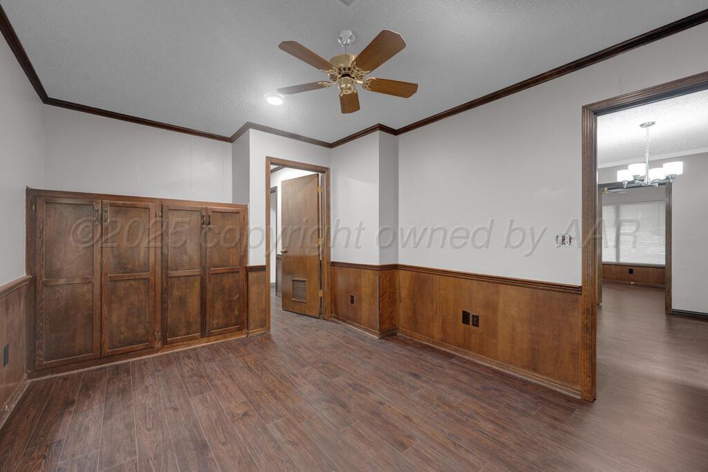 1022 Southwest 15th Avenue Amarillo, TX 79102 - Photo 9 of 11 a view of an empty room and wooden floor
