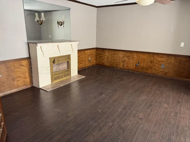 an entryway with wooden floor