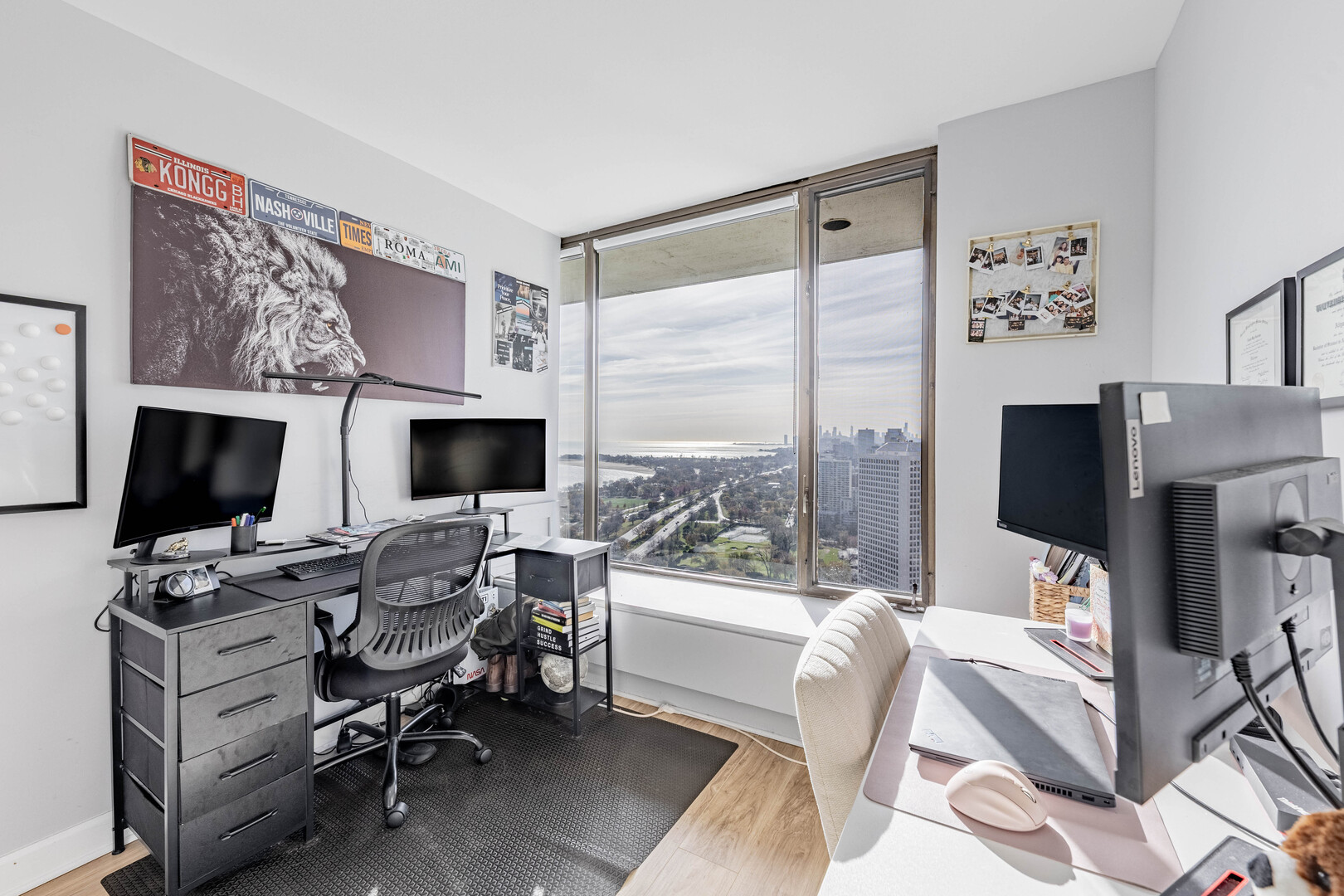 5455 North Sheridan Road, Unit 3906 Chicago, IL 60640 - Photo 14 of 28 a living room with furniture a flat screen tv and a fireplace