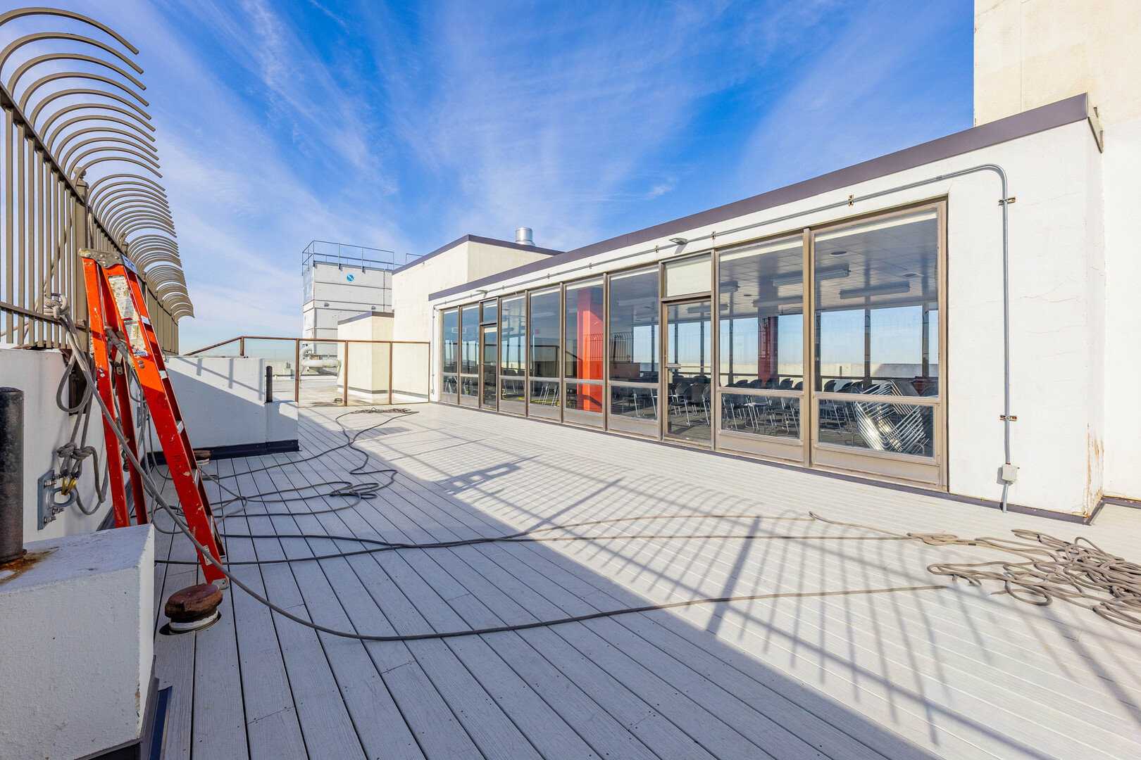 5455 North Sheridan Road, Unit 3906 Chicago, IL 60640 - Photo 17 of 28 a view of balcony with wooden floor and dining space