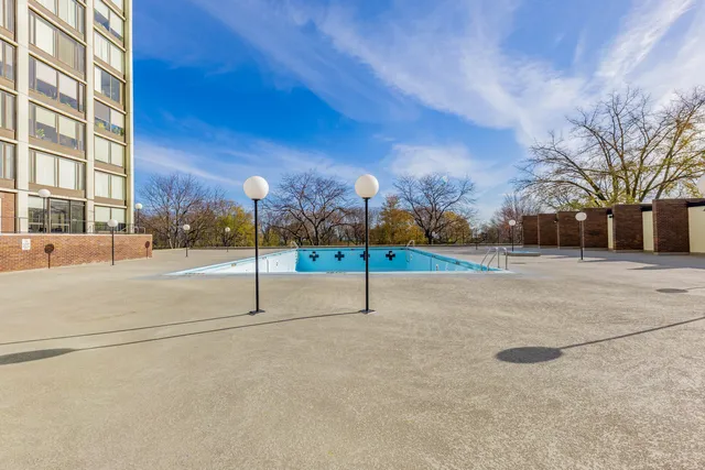 a view of a road with a building in the background
