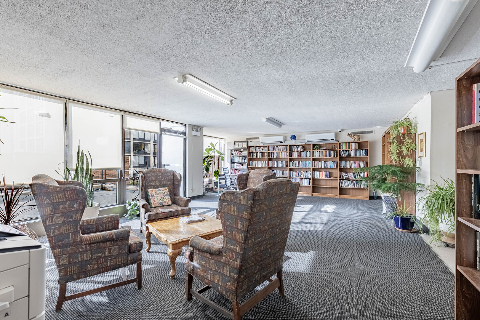 5455 North Sheridan Road, Unit 3906 Chicago, IL 60640 - Photo 22 of 28 a living room with furniture and a large window