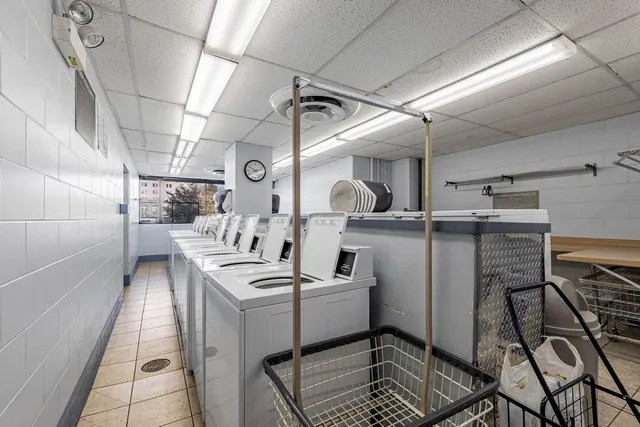 a utility room with washer and dryer