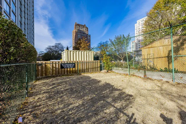 a view of terrace with wooden fence