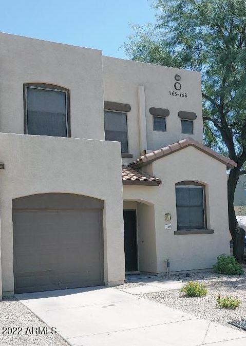 1886 East Don Carlos, Unit 165 Tempe, AZ 85281 - Photo 1 of 34 a front view of a house