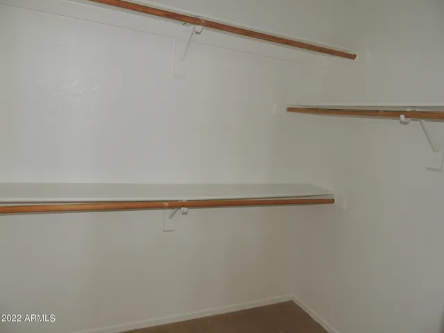 a view of a room with racks on the wall