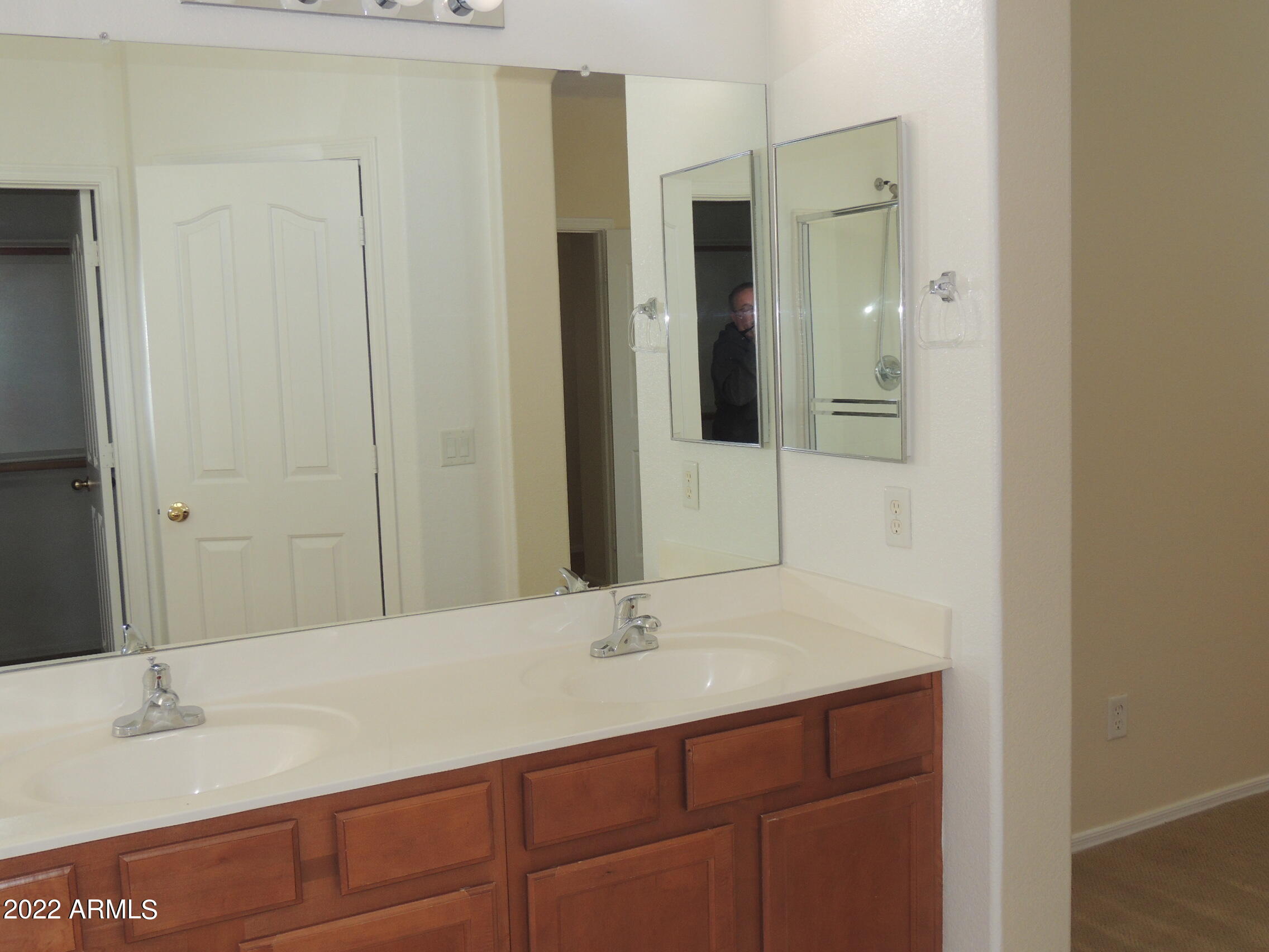 1886 East Don Carlos, Unit 165 Tempe, AZ 85281 - Photo 19 of 34 a bathroom with a sink and a mirror
