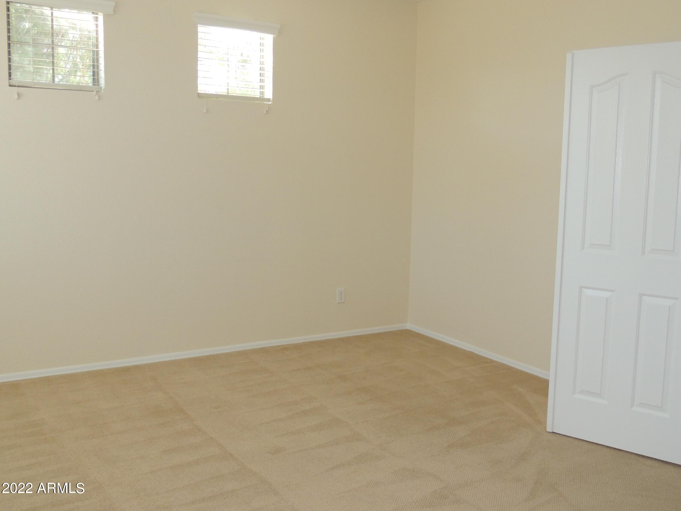 1886 East Don Carlos, Unit 165 Tempe, AZ 85281 - Photo 20 of 34 an empty room with windows
