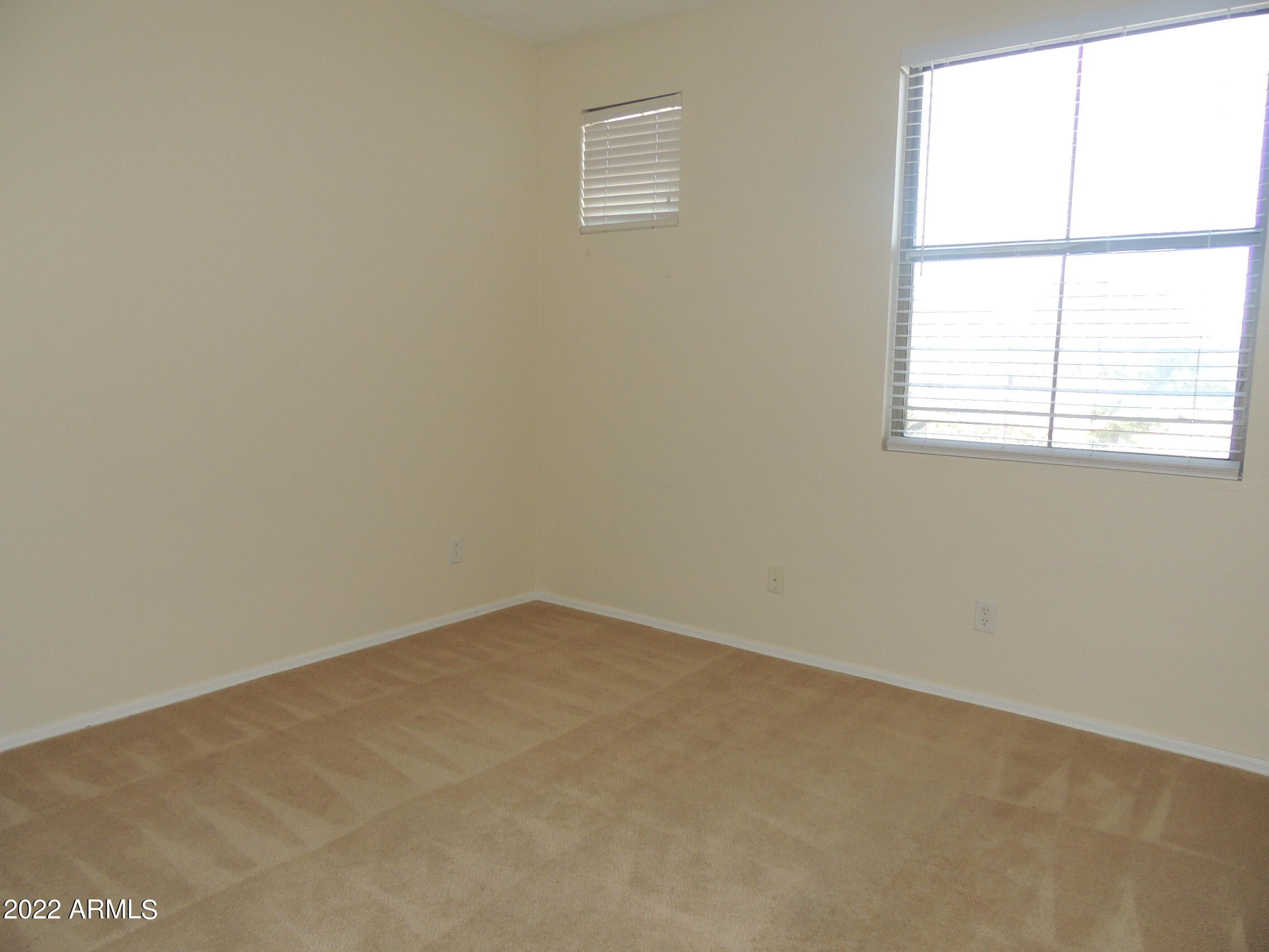 1886 East Don Carlos, Unit 165 Tempe, AZ 85281 - Photo 23 of 34 an empty room with a window