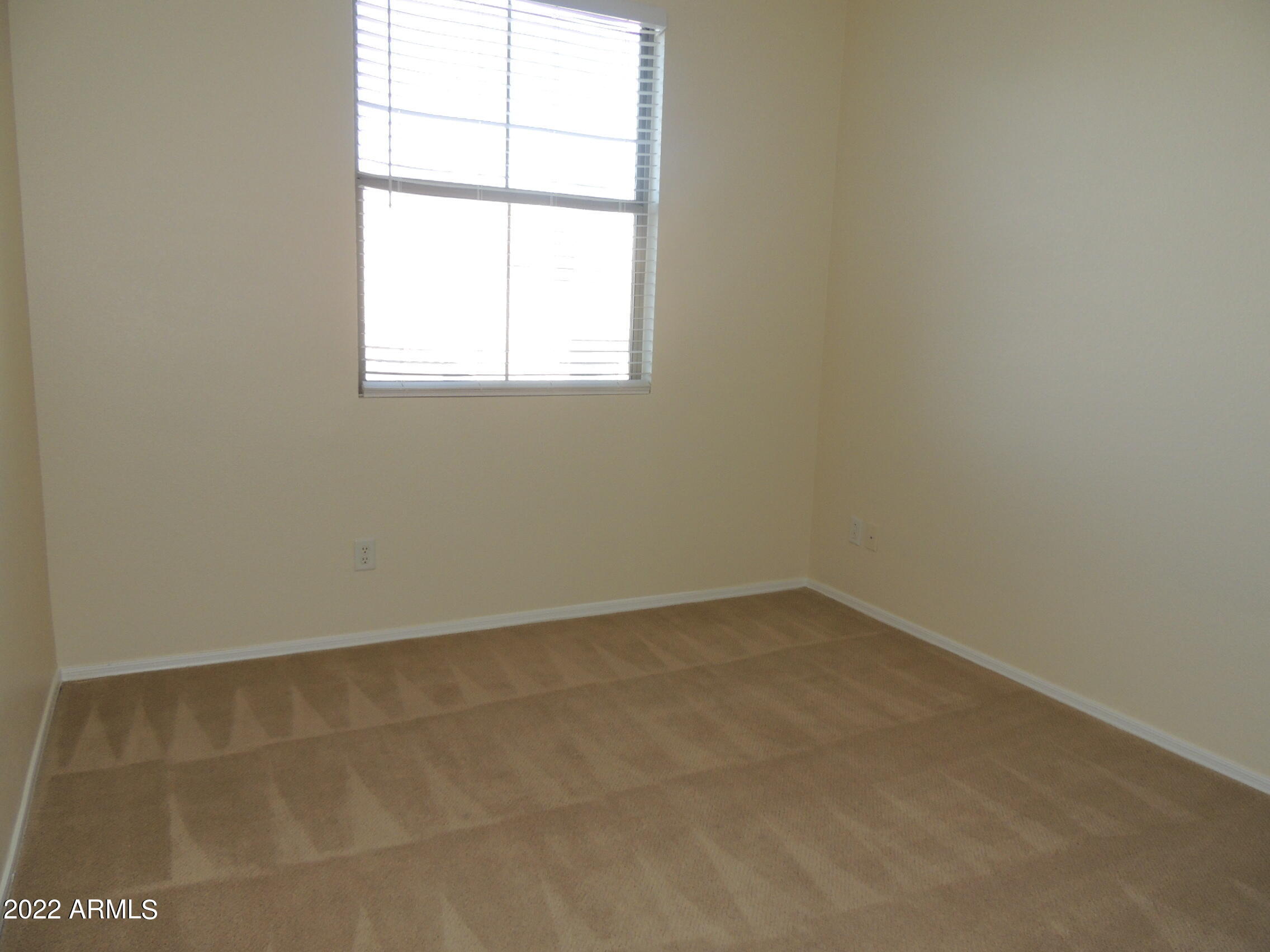 1886 East Don Carlos, Unit 165 Tempe, AZ 85281 - Photo 24 of 34 an empty room with a window