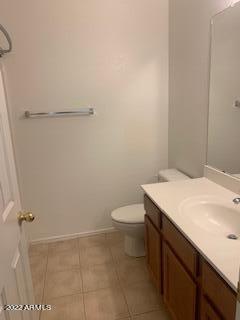 1886 East Don Carlos, Unit 165 Tempe, AZ 85281 - Photo 30 of 34 a bathroom with a granite countertop toilet and a sink