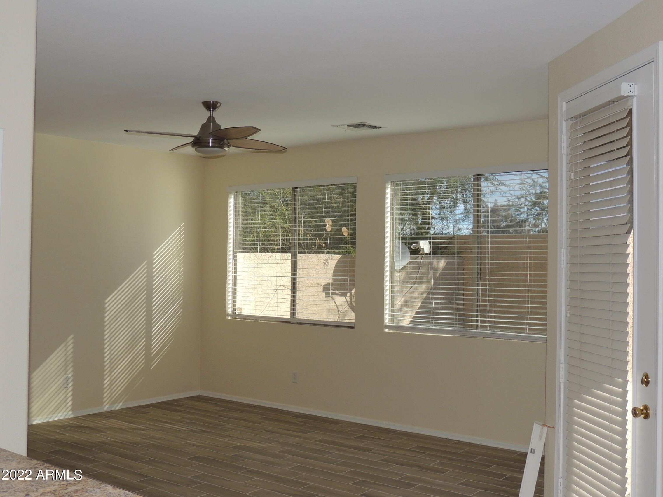 1886 East Don Carlos, Unit 165 Tempe, AZ 85281 - Photo 7 of 34 a view of an empty room with a window