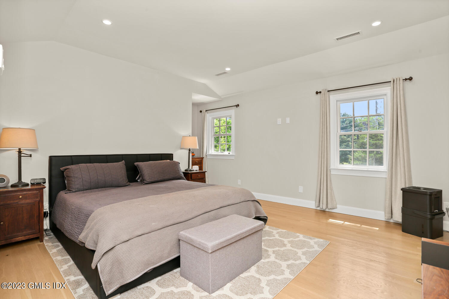 18 Candlelight Place Greenwich, CT 06830 - Photo 16 of 29 a bedroom with a bed and a couch