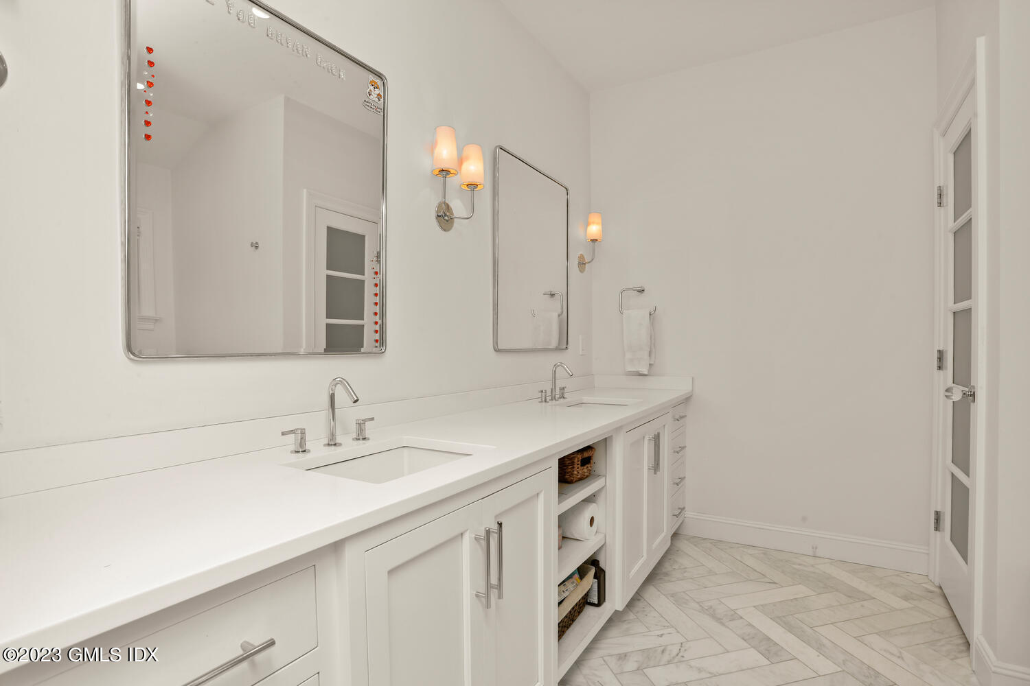 18 Candlelight Place Greenwich, CT 06830 - Photo 17 of 29 a spacious bathroom with a double vanity sink and mirror