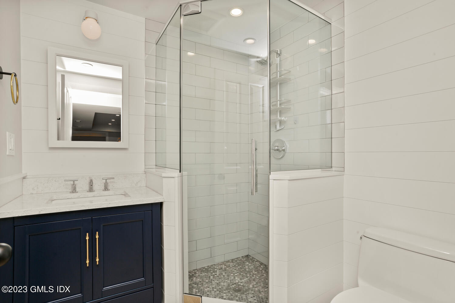 18 Candlelight Place Greenwich, CT 06830 - Photo 21 of 29 a bathroom with a sink a toilet and shower