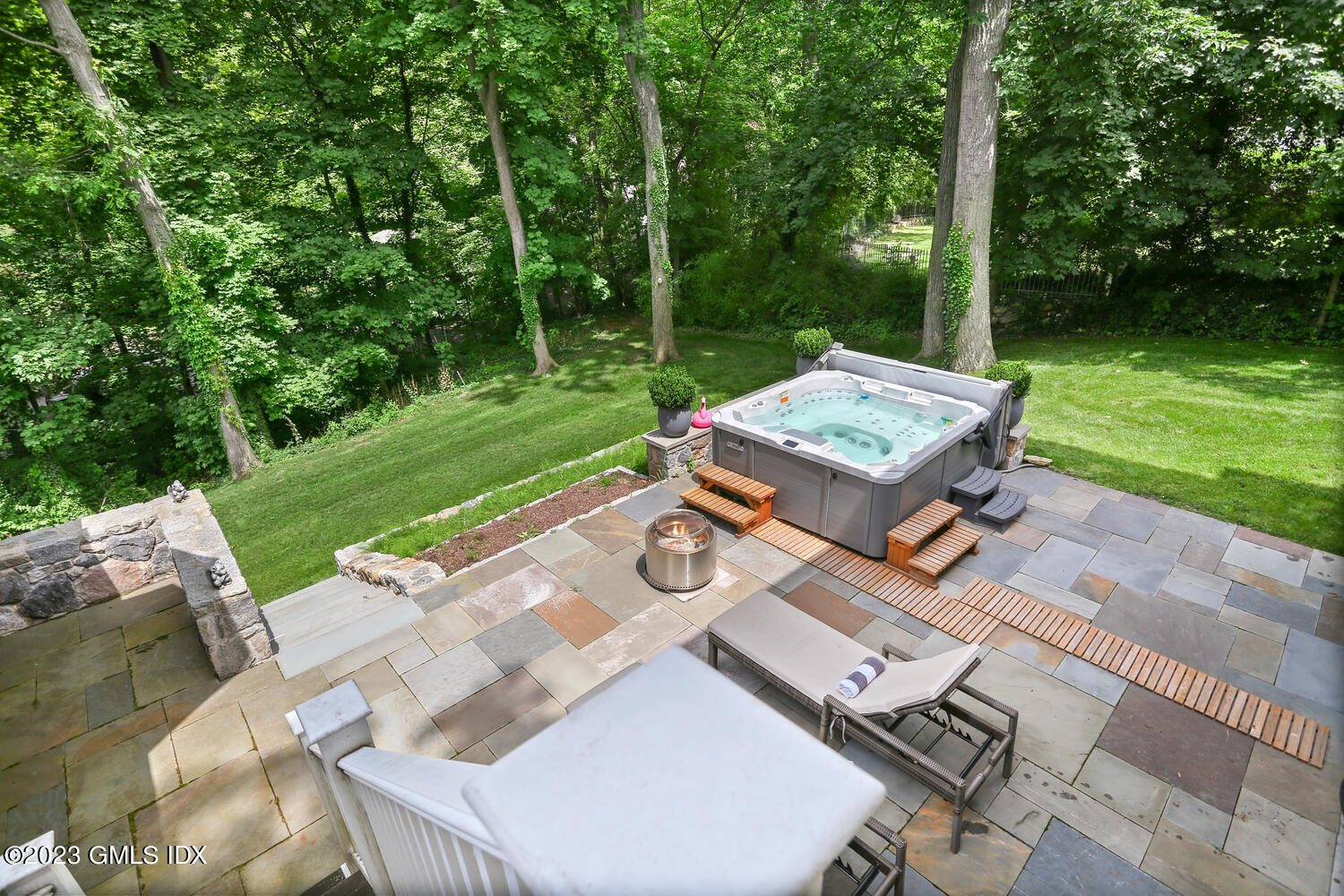 18 Candlelight Place Greenwich, CT 06830 - Photo 26 of 29 aerial view of a house with backyard patio and outdoor seating