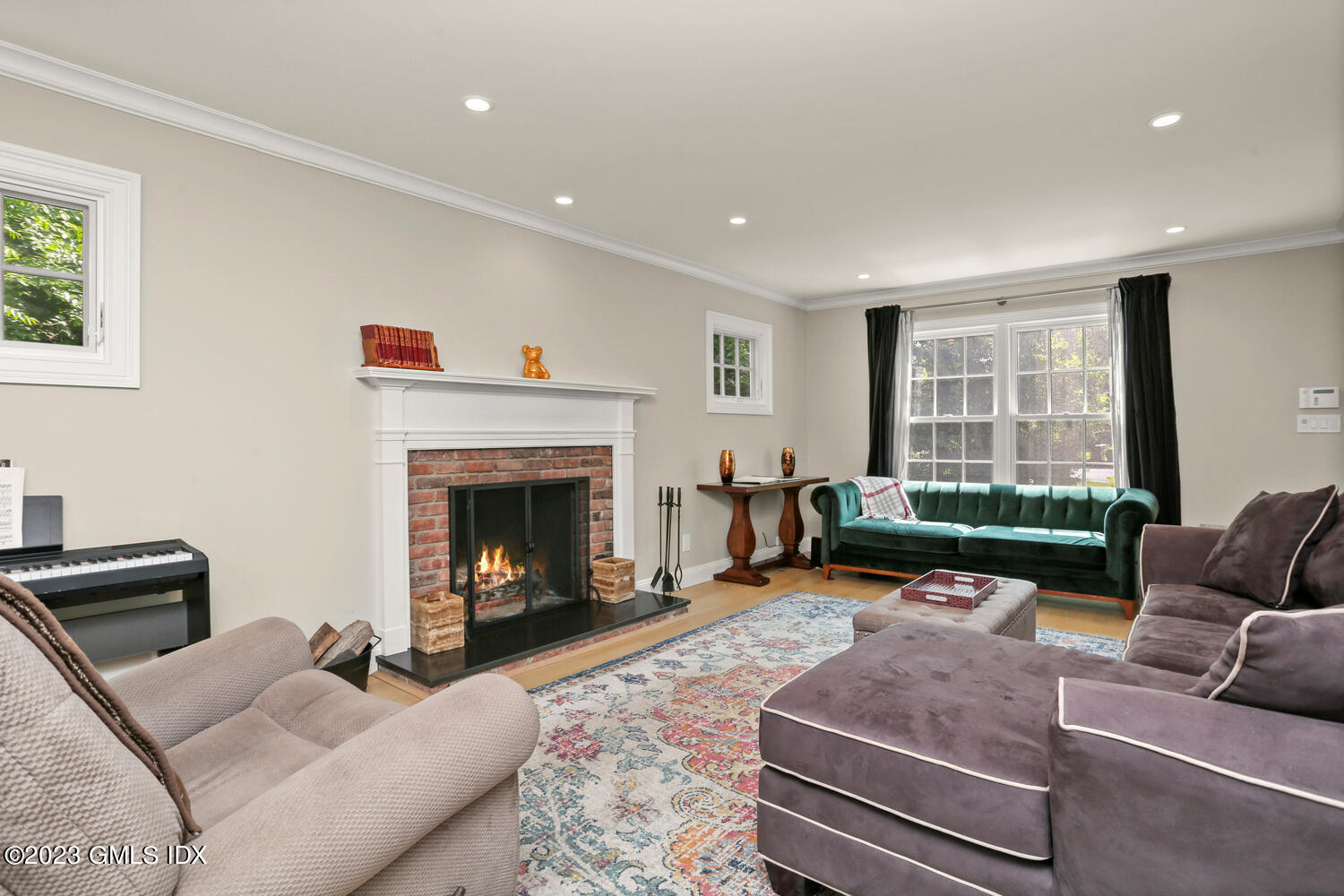 18 Candlelight Place Greenwich, CT 06830 - Photo 6 of 29 a living room with furniture and a fireplace