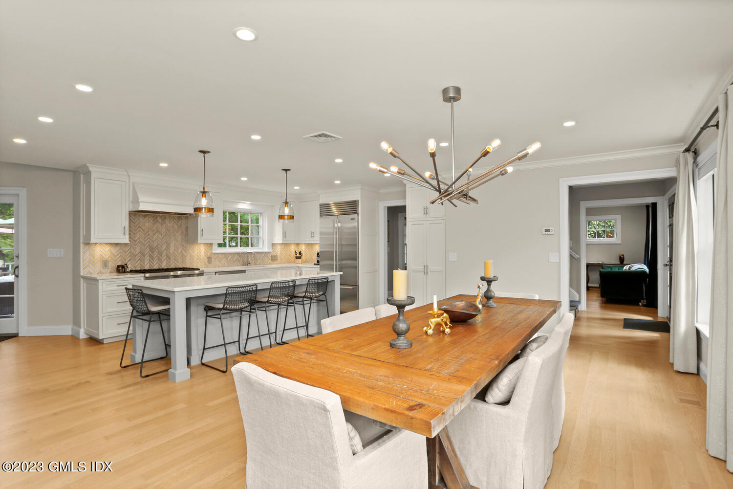 18 Candlelight Place Greenwich, CT 06830 - Photo 8 of 29 a large kitchen with a table and chairs