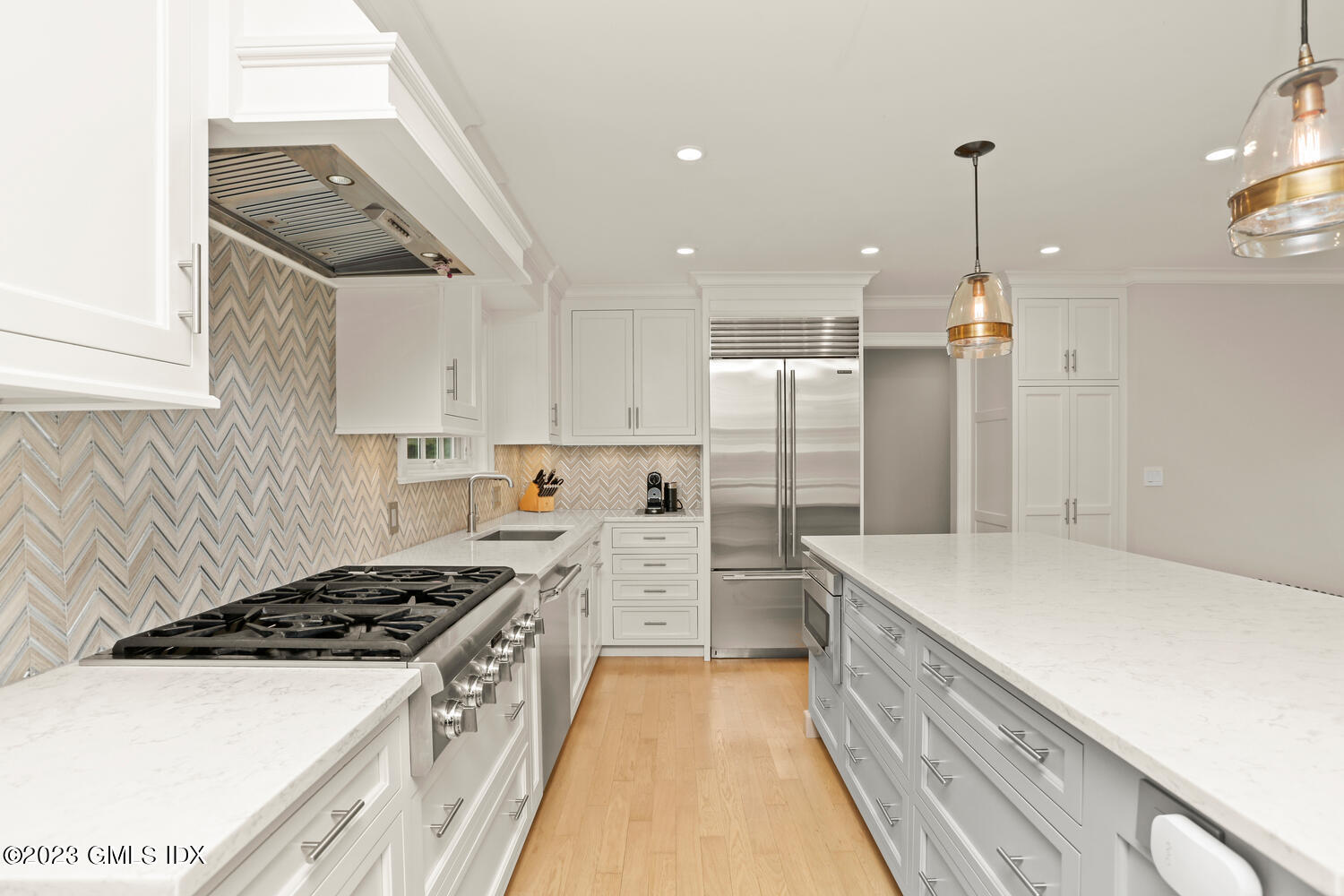 18 Candlelight Place Greenwich, CT 06830 - Photo 10 of 29 a kitchen that has a lot of stainless steel appliances