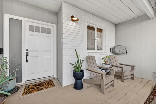 a view of a living room and dining room