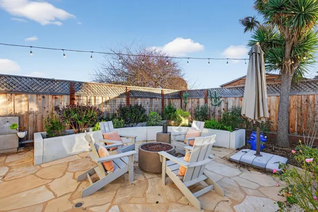 a outdoor space with patio couch and outdoor seating