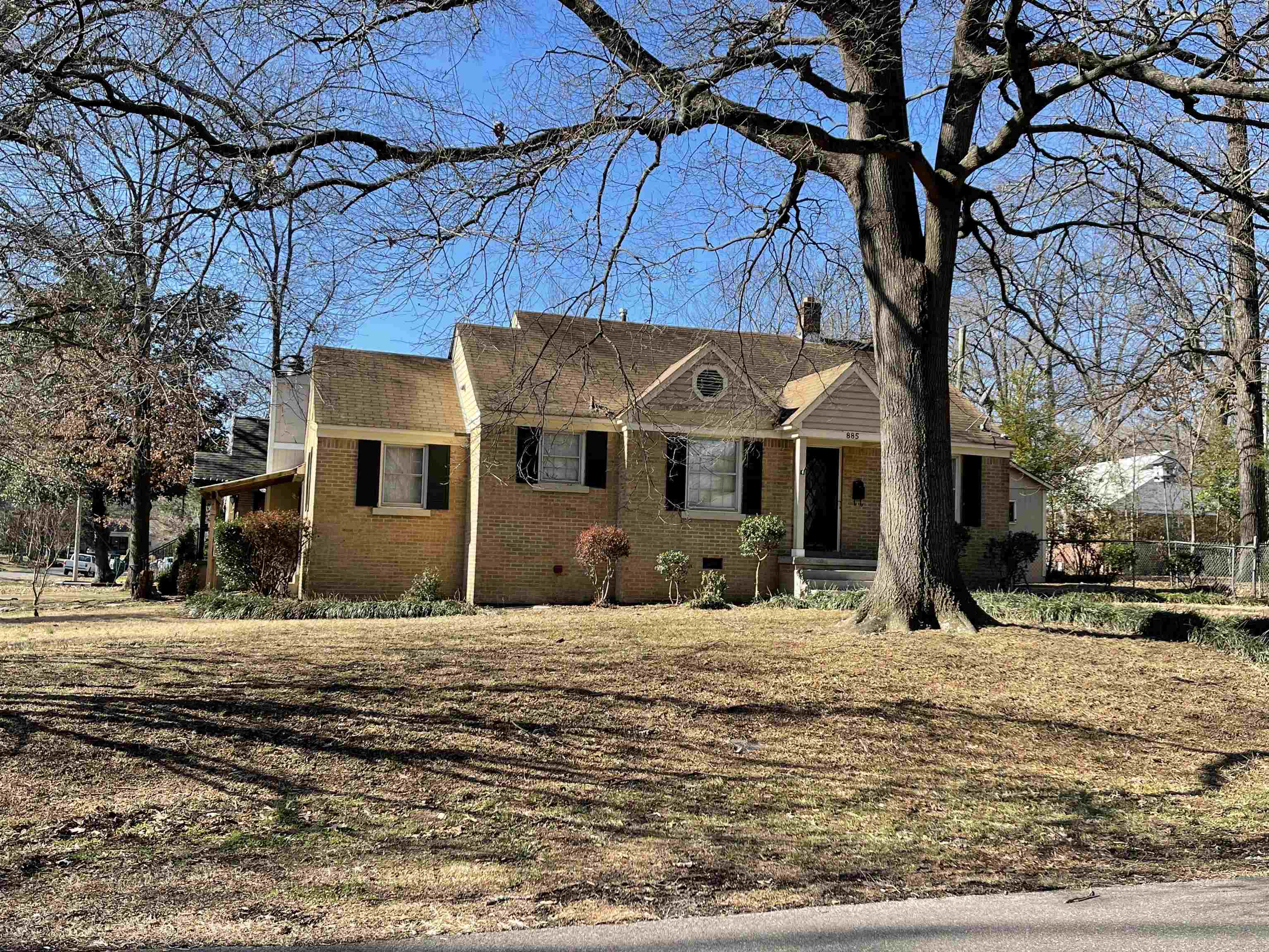 885 Echles Street Memphis, TN 38111 - Photo 16 of 18 a front view of a house with a yard