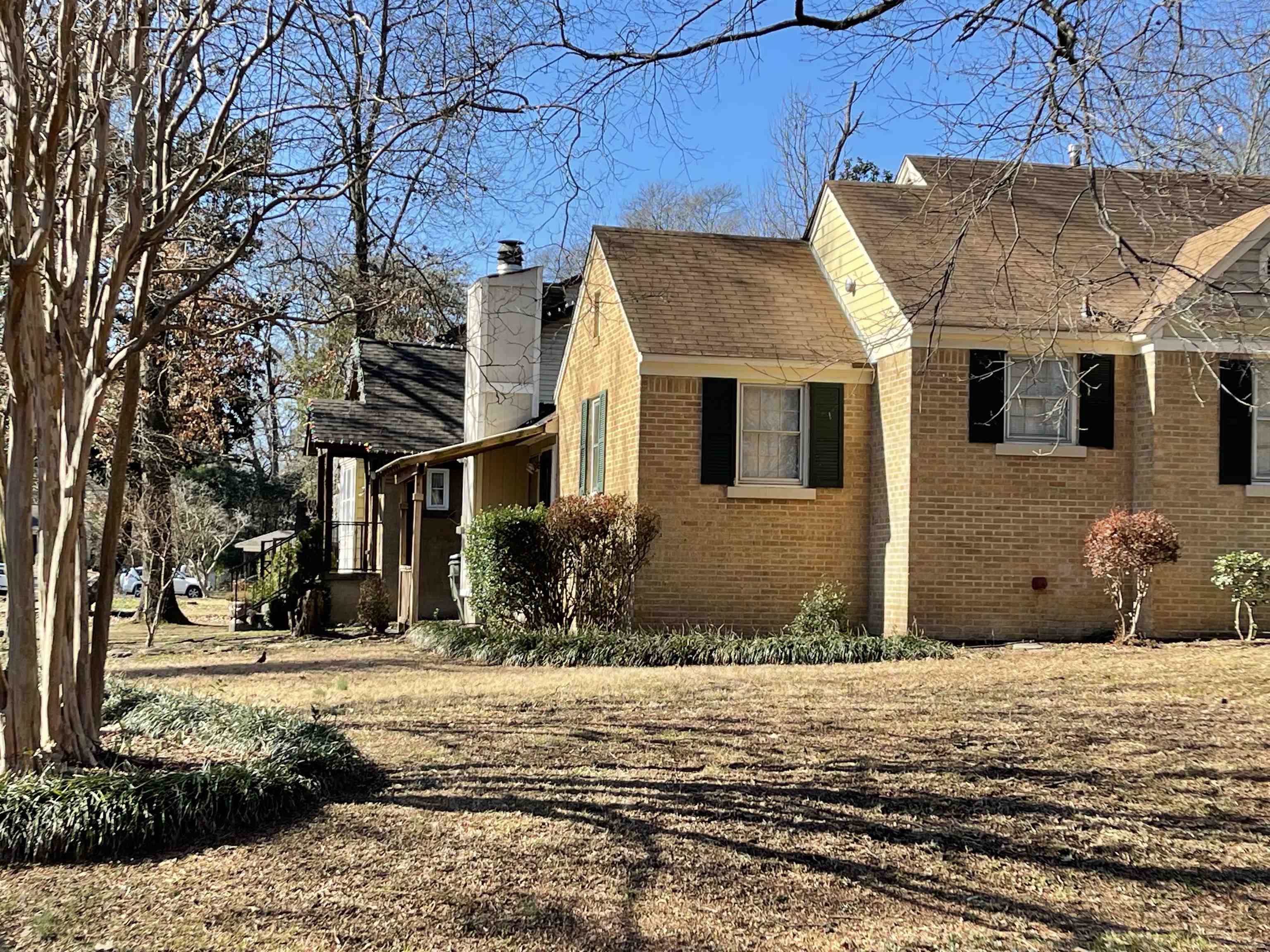 885 Echles Street Memphis, TN 38111 - Photo 17 of 18 a front view of a house with a yard