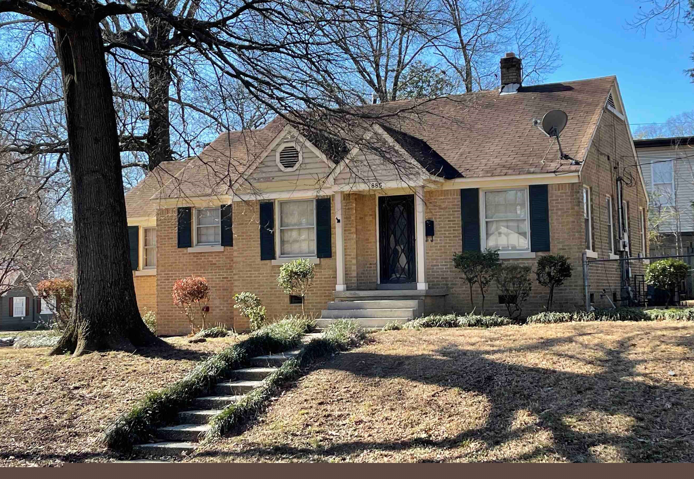 885 Echles Street Memphis, TN 38111 - Photo 2 of 18 a front view of a house with a yard