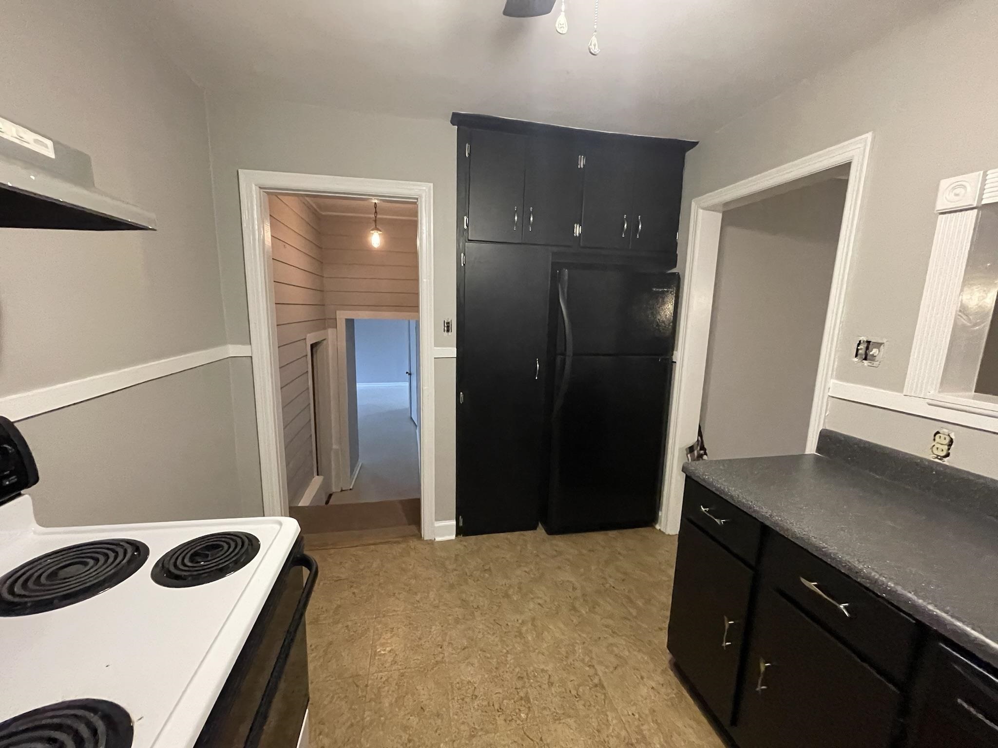 885 Echles Street Memphis, TN 38111 - Photo 4 of 18 a bedroom with a bed and a sink