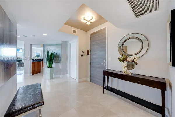 a view of living room and kitchen with furniture