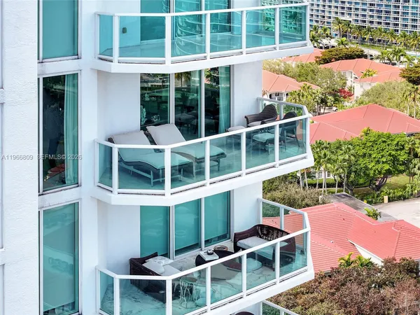 a view of a large building with a yard